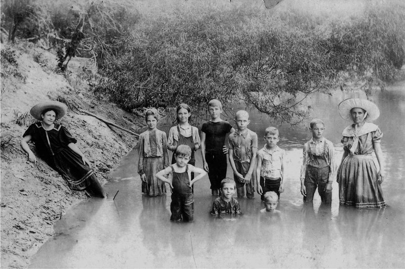 McAnally children in river near Cameron, TX